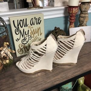 Cream wedge sandals with gold detail